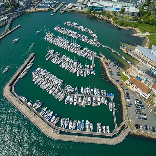 Aerial shot of Plymouth Marina on a file day showing dozens of boats